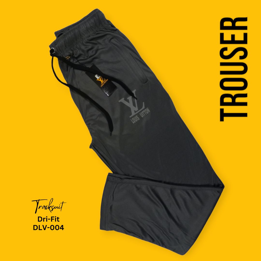 Gray Men's premium dri-fit tracksuit with round neck and half sleeves. Tape to fasten trousers at waist. Loose-fitting. Zipper pockets. Perfect for workouts and casual wear.