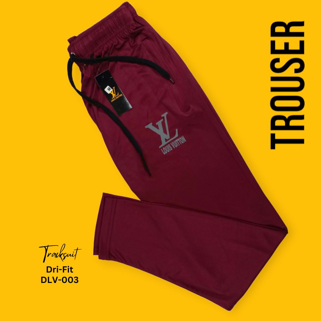 Maroon Men's premium dri-fit tracksuit with round neck and half sleeves. Tape to fasten trousers at waist. Loose-fitting. Zipper pockets. Perfect for workouts and casual wear.