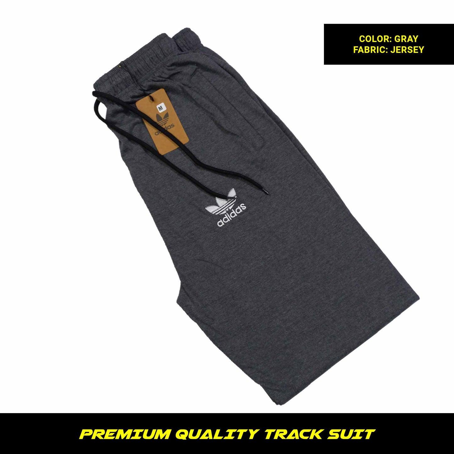 Gray men's premium jersey tracksuit with round neck and half sleeves. Tape to fasten trousers at waist. Loose-fitting. Zipper pockets. Perfect for workouts and casual wear.