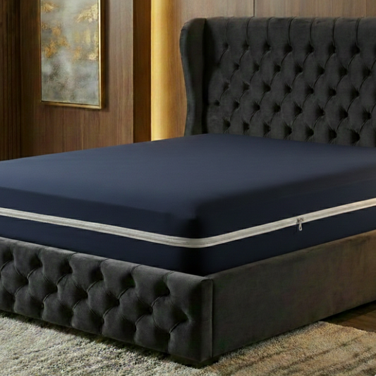 Waterproof zipper mattress protector king size in navy blue color on bed